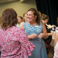 PSS luncheon attendees chatting